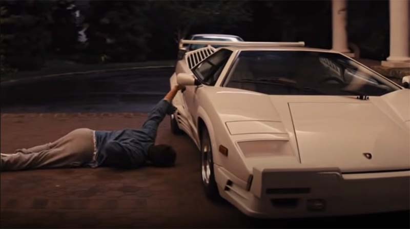 Leonardo DiCaprio crawling to his Lamborghini Countach in the film: Wolf of Wall Street