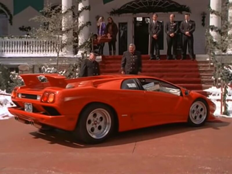 Lamborghini Diablo pulling up to a resort hotel in Aspen in the film Dumb and Dumber.