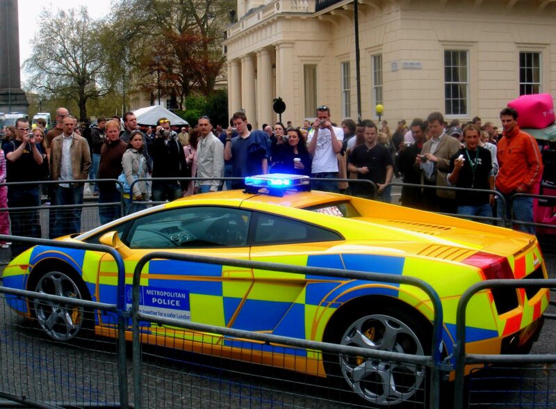 Lamborghini police car, a Gallardo, surrounding by barricades at an event in London