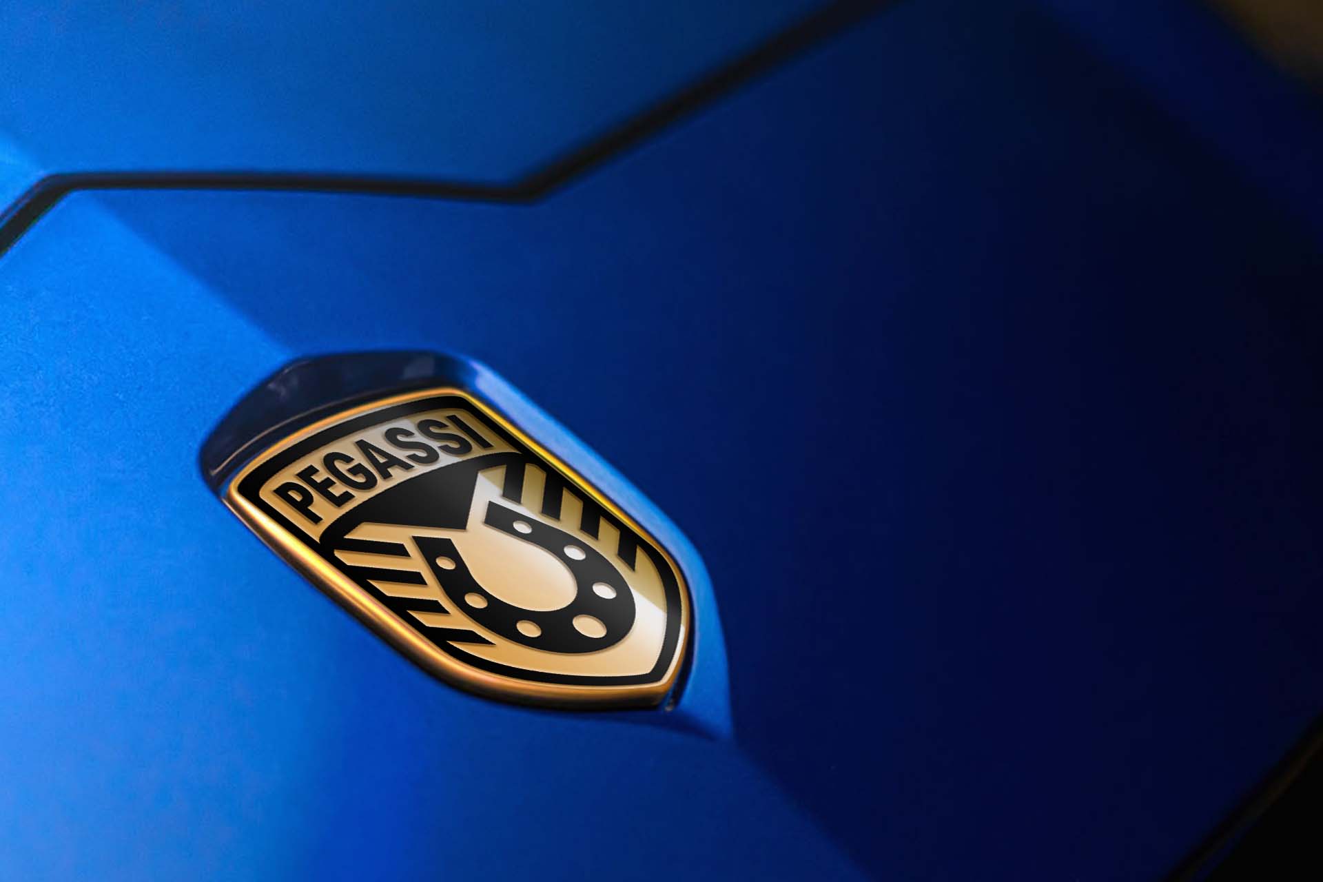 Pegassi badge on a blue supercar in real life.