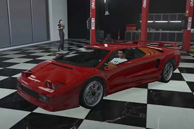 Pegassi Infernus Classic in Grand Theft Auto, the video game, in a mechanics garage with a checkerboard floor.
