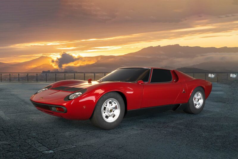 Lamborghini Miura in red at sunset with clouds.