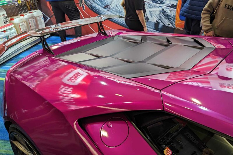 pink Lamborghini Huracan engine cover with louvers.