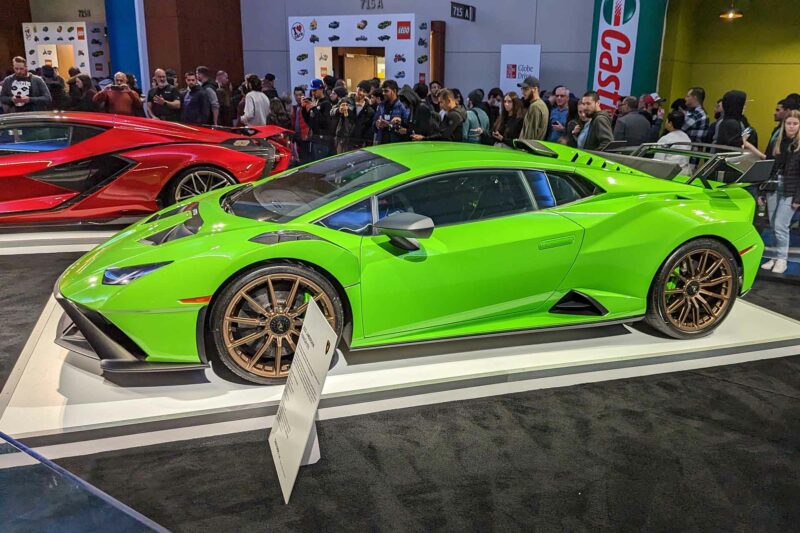 Lamborghini Huracan STO side on a platform at an autoshow.