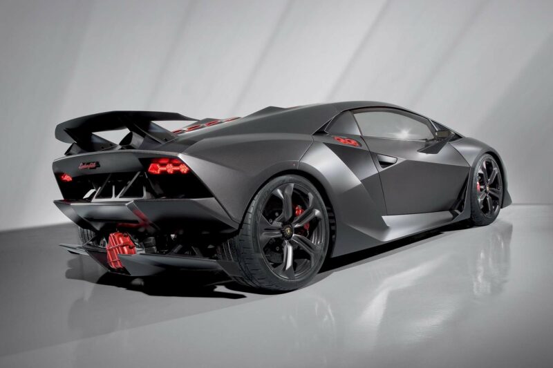 Tail of a Lamborghini Sesto Elemento in finished carbon fibre with red accents.