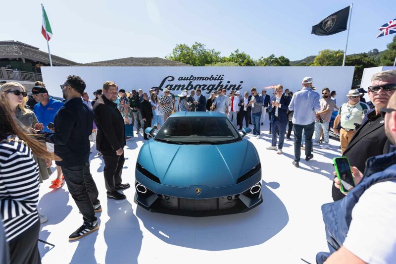 Front of a blue Lamborghini Temerario with people standing around it at it's debut in Monteray California.