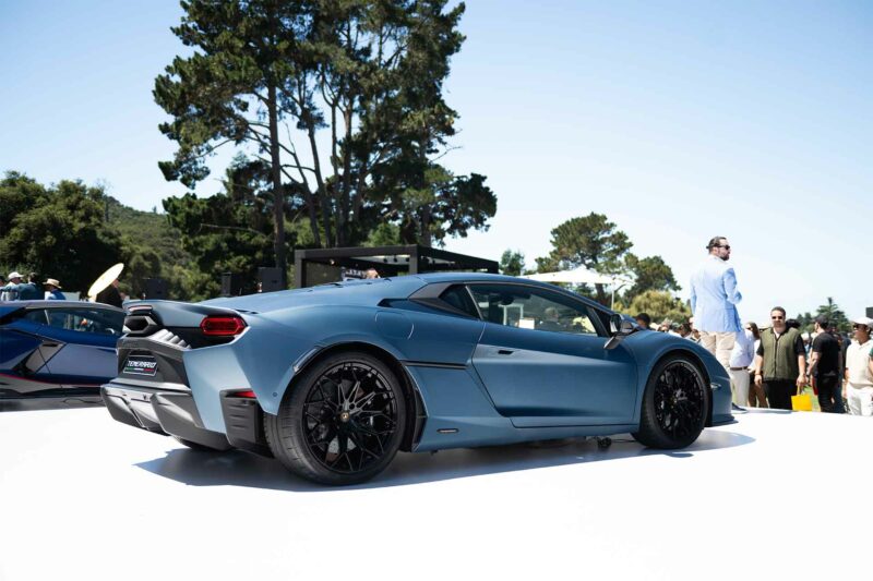 Rear corner view of a blue Lamborghini Temerario at it's debut in Monteray California.