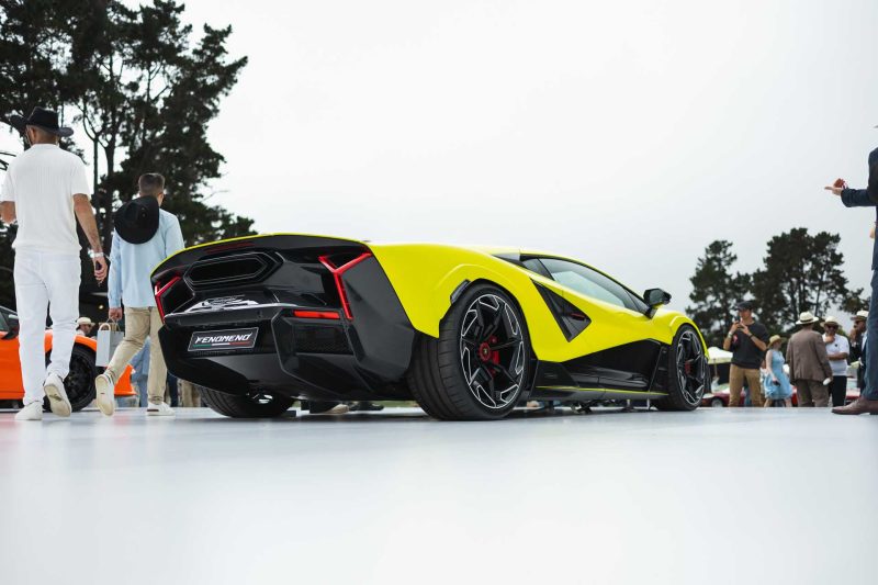 Photo of yellow Lamborghini Femoneno rear quarter view from down low.