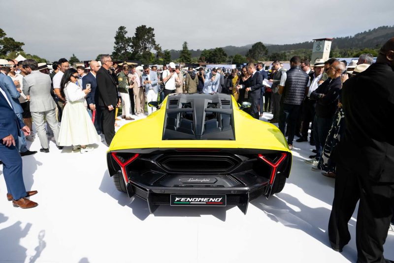 Photo of yellow Lamborghini Femoneno from the back.