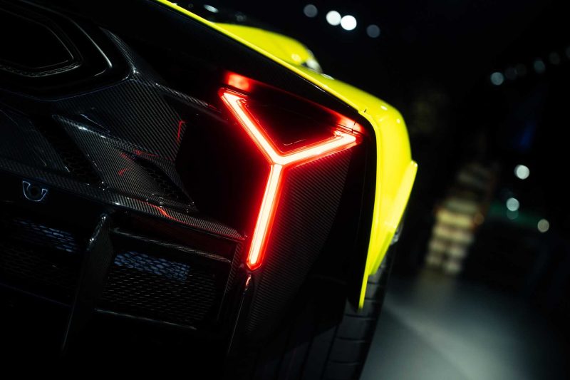 Photo of yellow Lamborghini Femoneno rear right side.