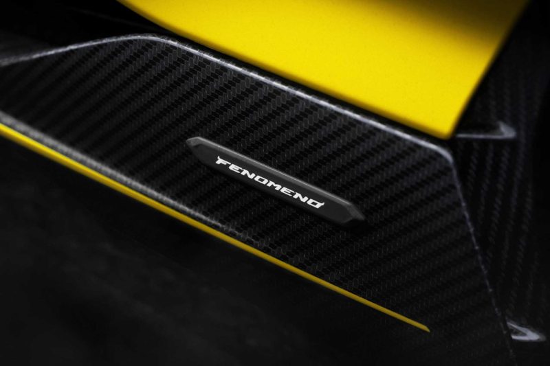 Photo of yellow Lamborghini Femoneno sil badge