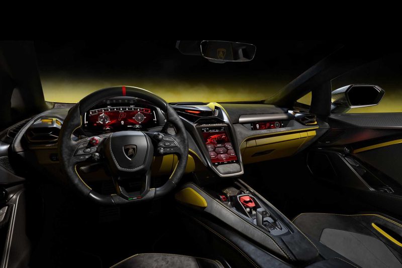 Rendering of Lamborghini Femoneno interior with yellow accents showing steering wheel and dash.